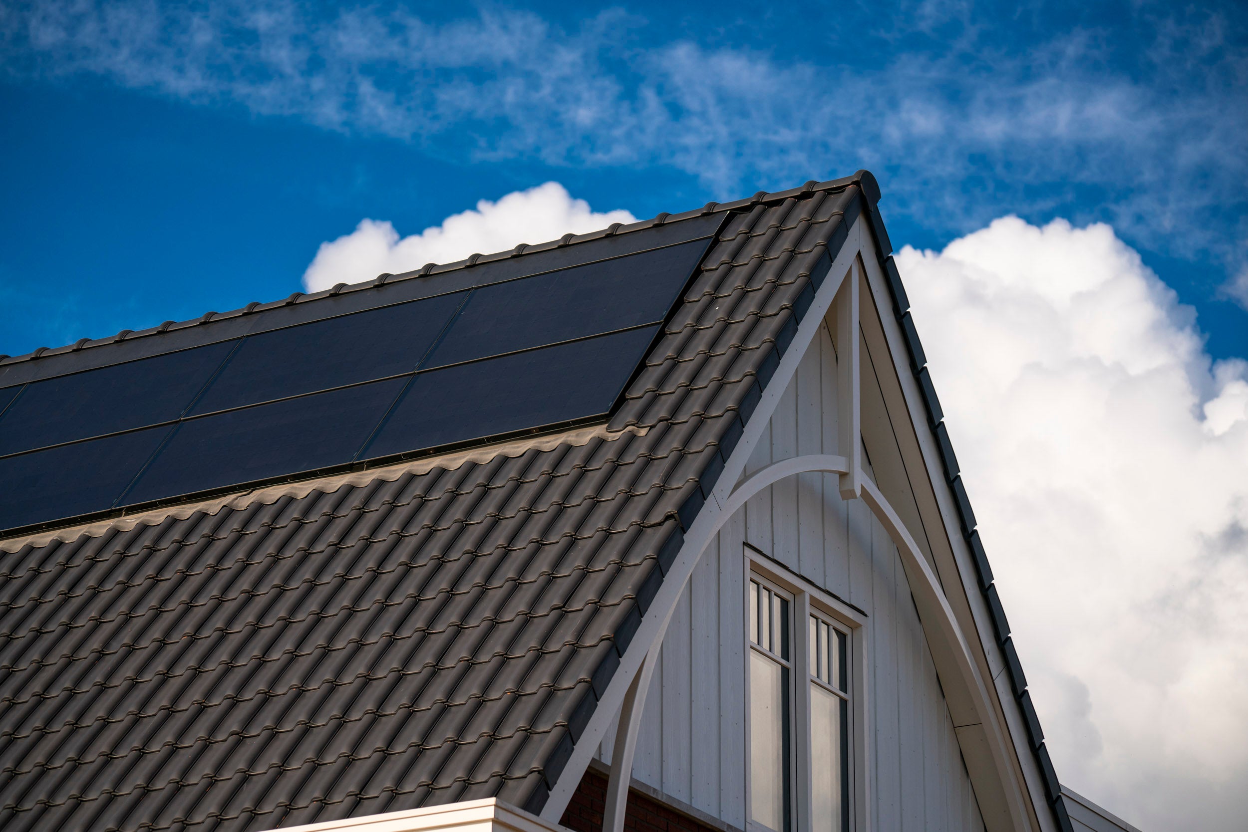 Wat betekent "in-dak zonnepanelen"?